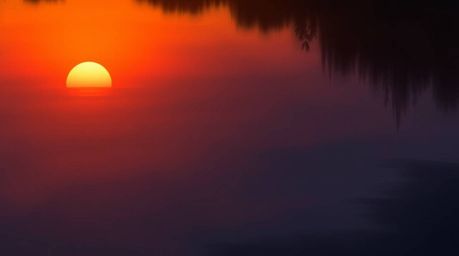 A stunning digital painting captures a serene sunset reflected in the tranquil waters of a calm pond. The artwork showcases s