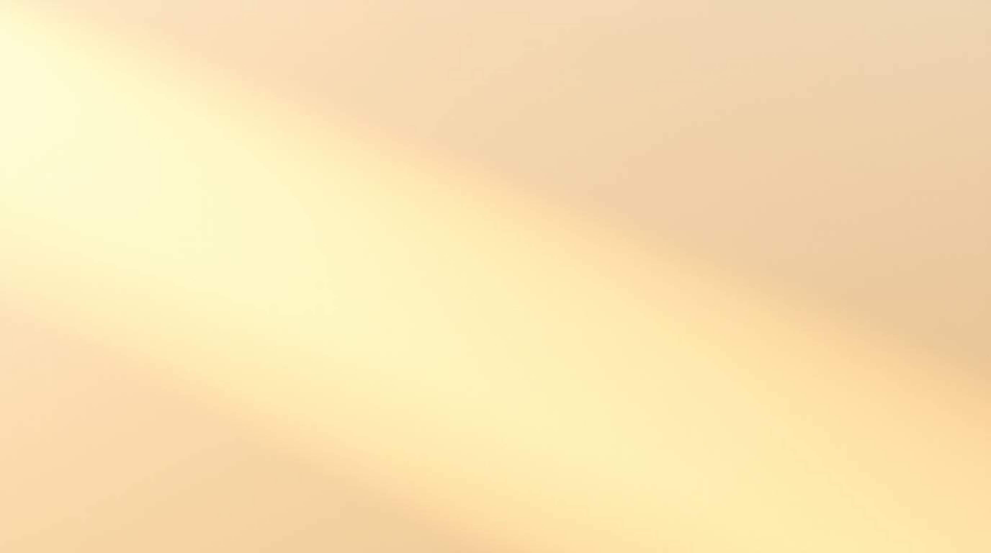 Experience the serene beauty of a gentle soft light casting a warm golden glow on an abstract gradient background, enhanced b