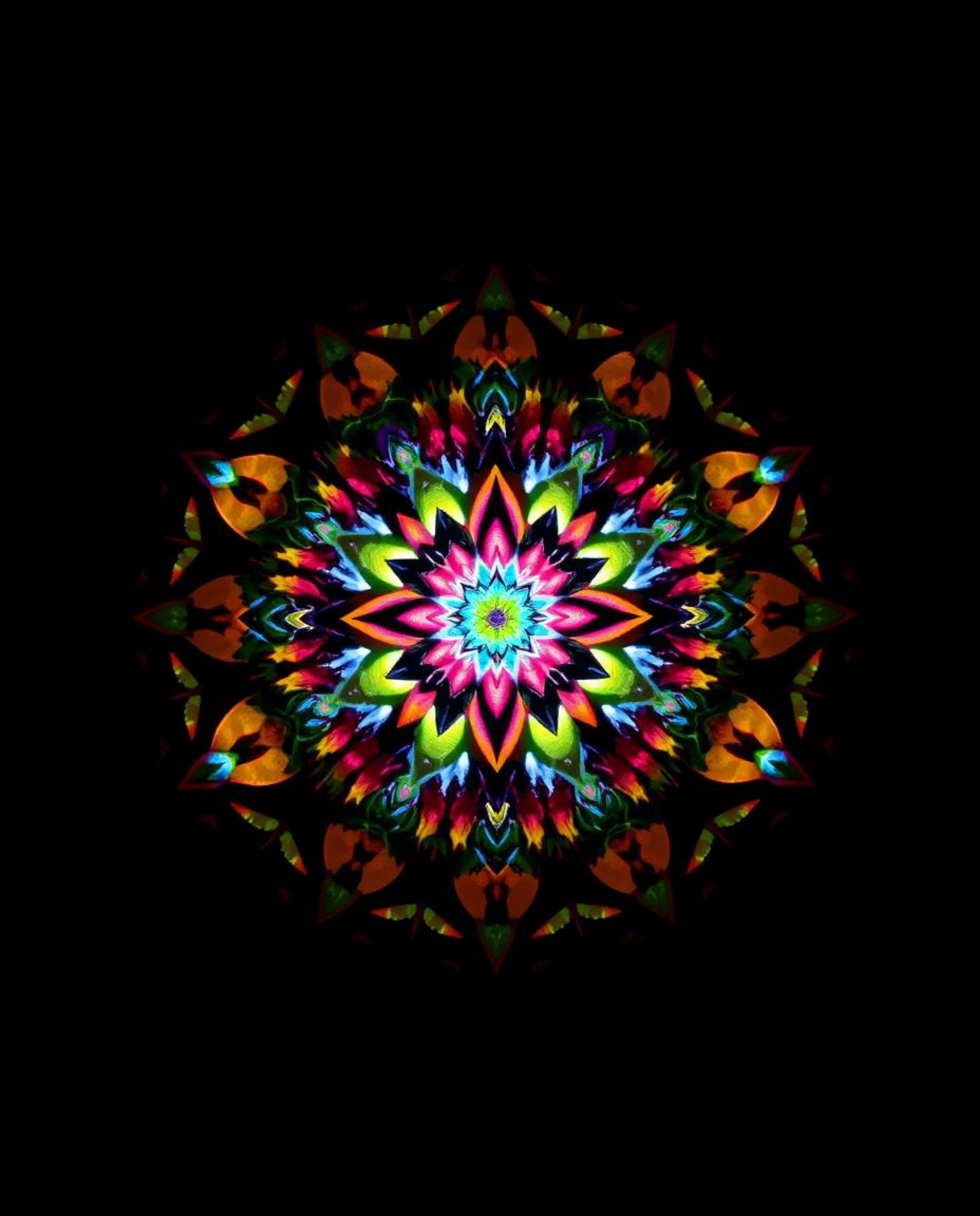 Experience an ethereal spiritual vibe with a geometric floral mandala brought to life by contrasting chiaroscuro lighting and