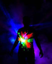 A vibrant and energetic scene featuring volumetric lighting illuminating a human silhouette formed by colorful splash pattern