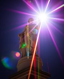 This captivating long exposure photograph features a brilliant lens flare and a vibrant glitch effect layered upon a classica