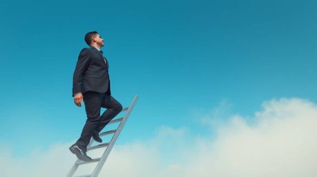 An abstract depiction of success portrays a determined businessperson ascending a transparent ladder into a blue sky above sk