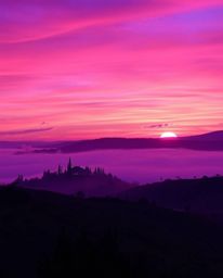 Sunset over misty Tuscan hills: vivid purples, deep ultraviolet hues, high contrast, warm candlelight glow, flickering flames
