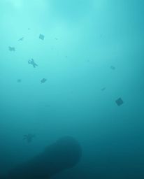 Immerse yourself in a surreal atmosphere of thick fog and a cool color palette, where a storm rages with flying objects and b