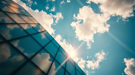Experience the mesmerizing fusion of modern architecture and the boundless sky in this extreme macro close-up. A glass buildi