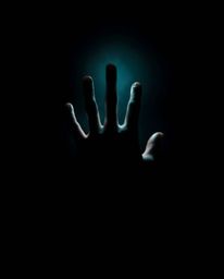 Experience a chilling atmosphere enhanced by dramatic chiaroscuro lighting, portraying a hand reaching desperately for light 