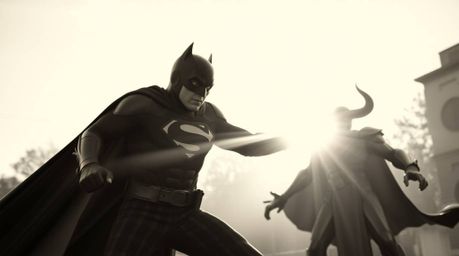 A timeless and elegant battle unfolds in a classic black and white image bathed in the warm glow of golden hour light. A supe