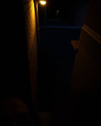A chilling scene captured from a high-angle perspective, showcasing eyes peering out from a shadowed alley at night. The imag