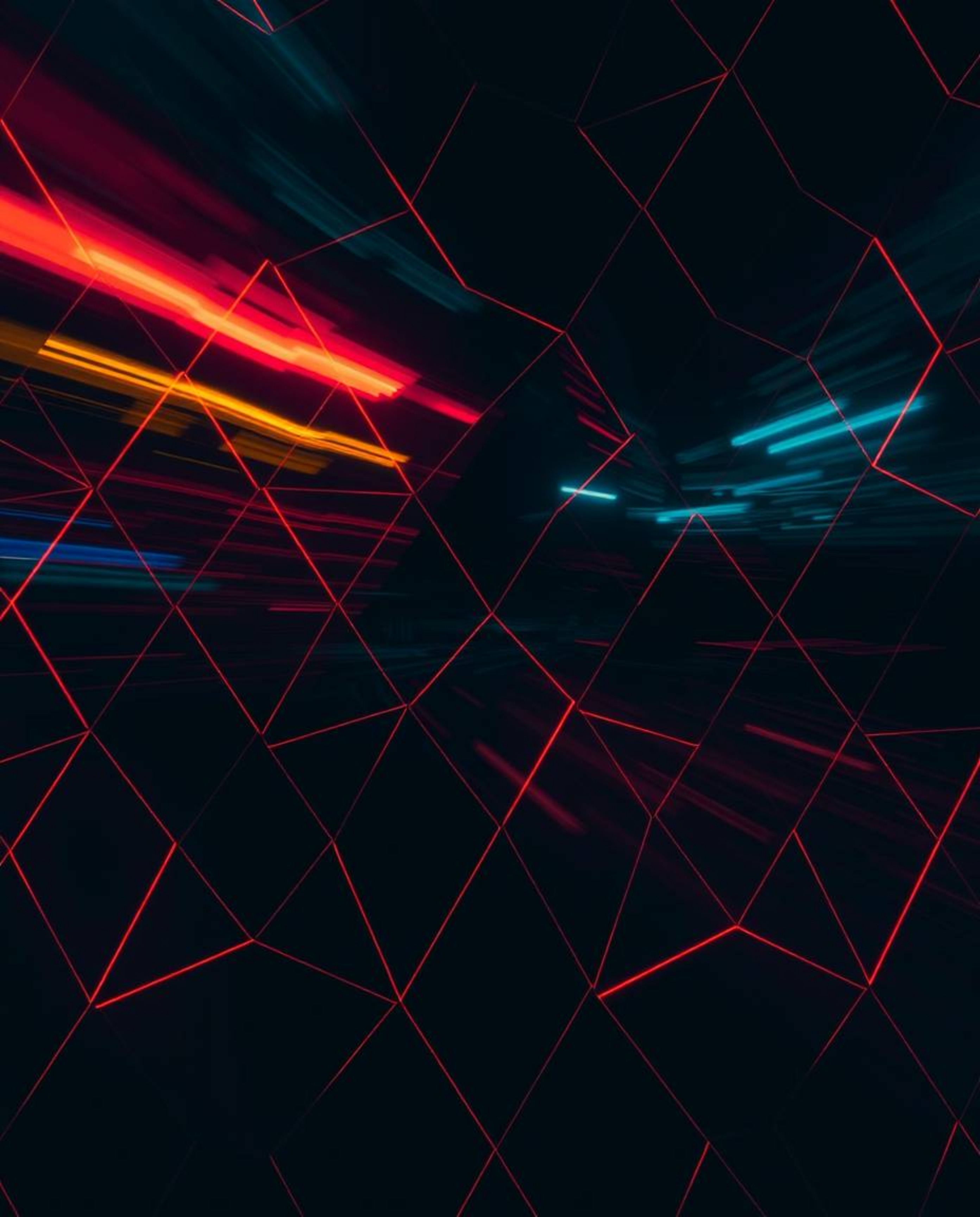 A captivating long exposure photograph showcases a seamless geometric pattern of hexagons and triangles bathed in a vibrant n