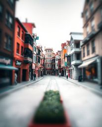 This image presents a surreal street scene rendered in an intricate origami style with a blurred bokeh effect. Buildings are 