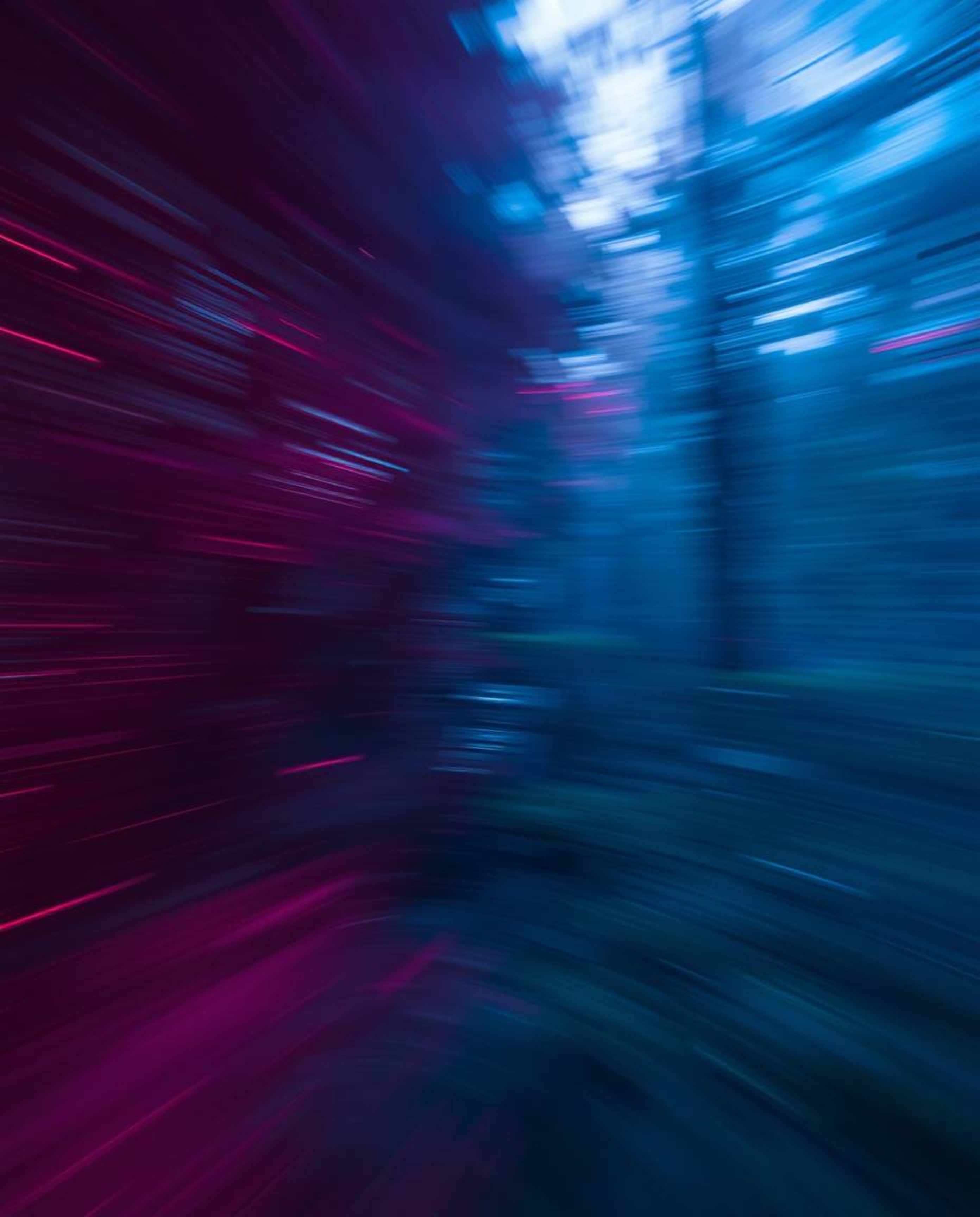 This creative light art piece captures dynamic motion with rich burgundy and deep blue hues. A digital glitch effect is layer