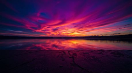 A breathtaking image of a serene lake mirroring a vivid sunset sky, rendered in captivating deep ultraviolet hues cast upon a