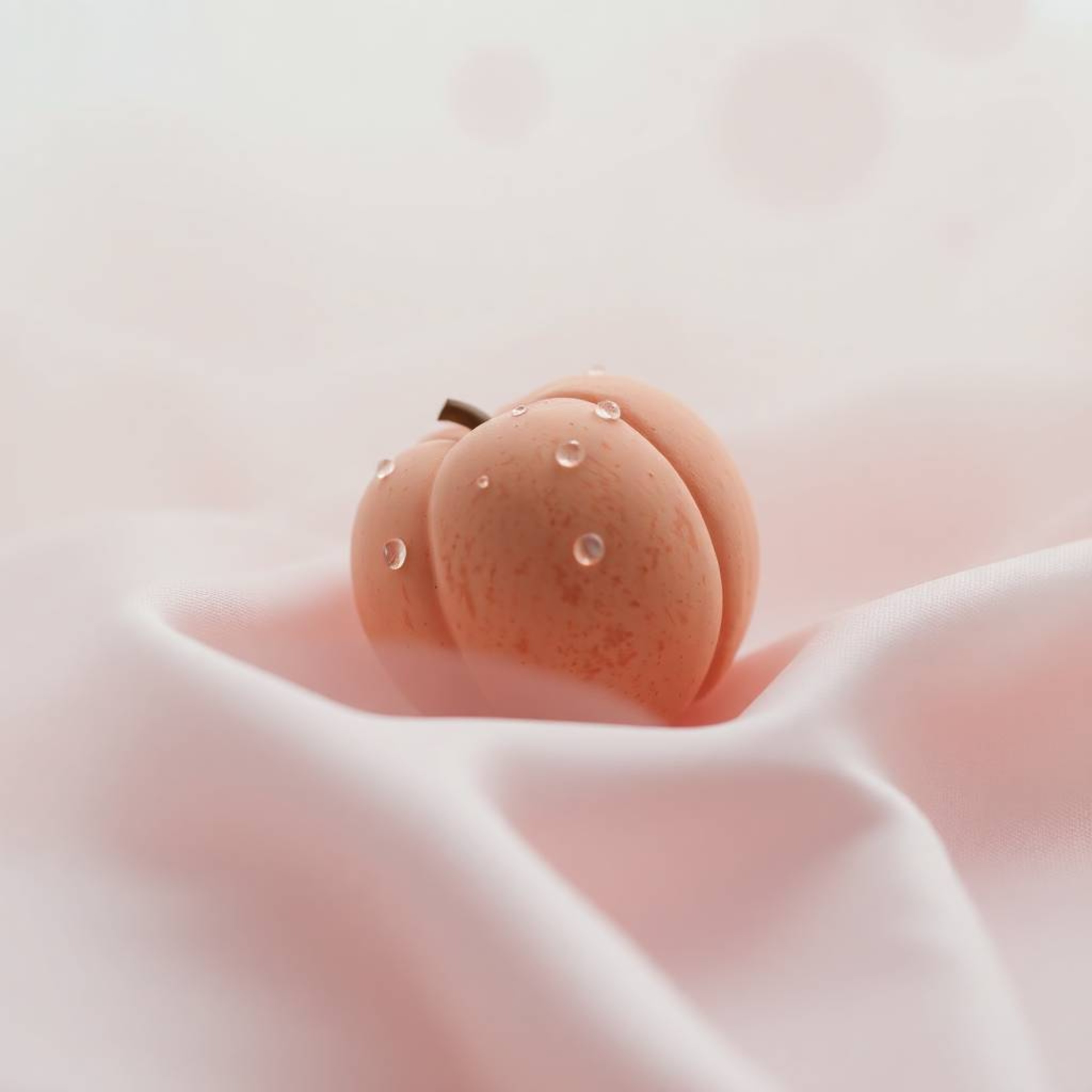 Immerse yourself in a close-up ASMR experience featuring a meticulously sculpted clay peach resting on delicate pastel pink s