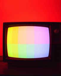 Explore the captivating world of warm retro-style TV screen glitches with mesmerizing RGB separation. This effect features a 