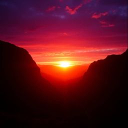 Experience the dramatic beauty of a cinematic sunset over a tranquil mountain valley.  Warm golden hour light blends seamless