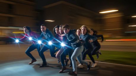 This image showcases a unique team of misfit heroes uniting, captured through the art of long-exposure photography.  The tech