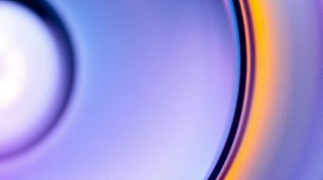 A captivating close-up showcases a glass object masterfully reflecting smooth gradient textures and vibrant complimentary col