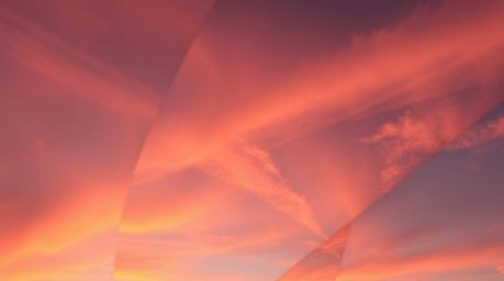 A dramatic low-angle shot presents a captivating split gradient texture reminiscent of a sunset sky, offering a soft and drea