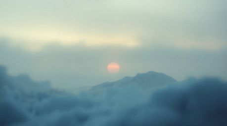 Experience the serene beauty of a sunset over icy polar glaciers. This image features a soft cinematic haze, soft focus, mute