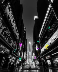 Explore a striking black and white image of a futuristic cityscape, captured from a dramatic low angle perspective. Colorful 