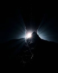 Experience the intense beauty of creative light art. This ethereal piece features a digital glitch landscape breaking apart i