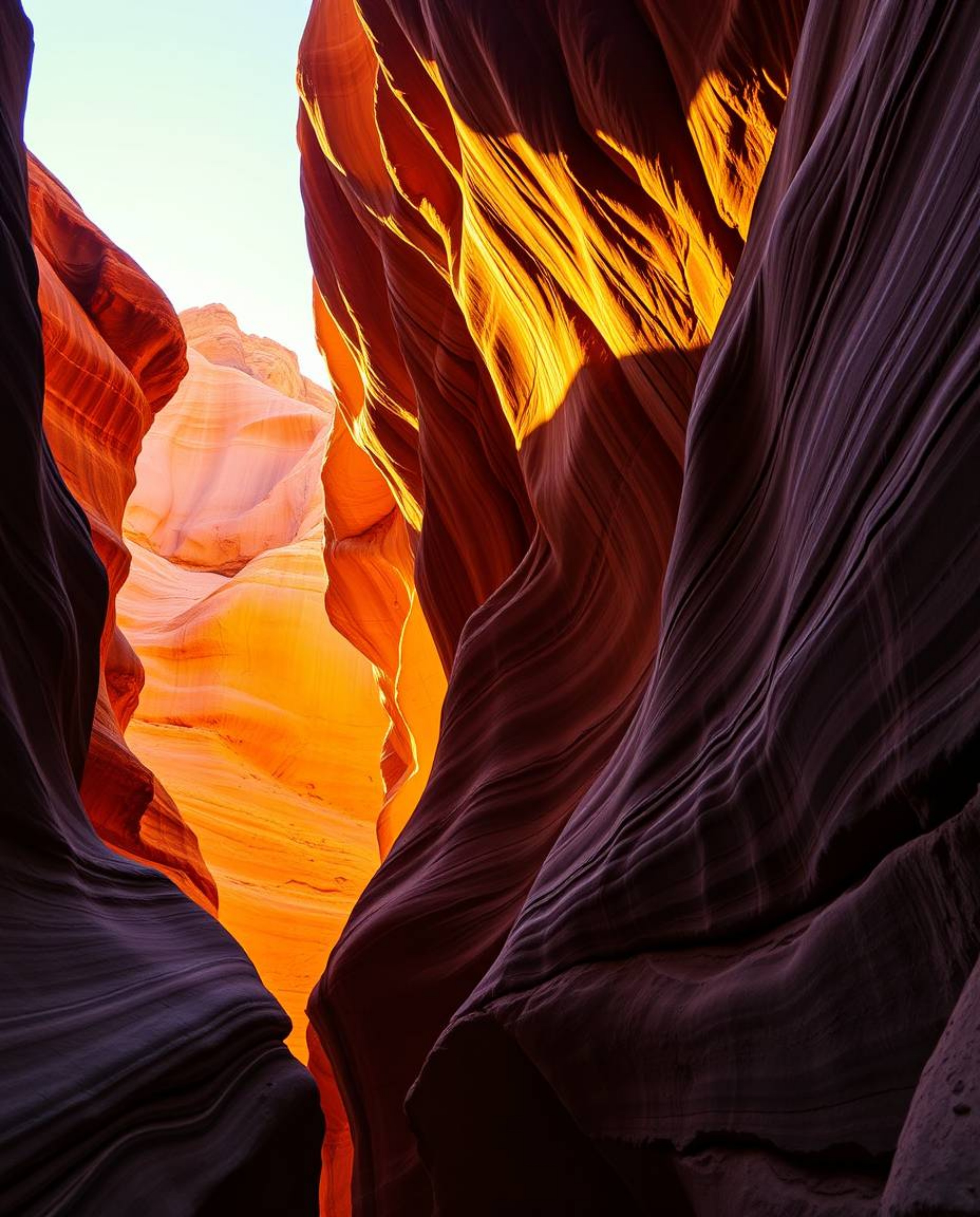 This artwork captures a sunset illuminating sandstone canyon cliffs, defined by its use of strong, hard light. A striking col