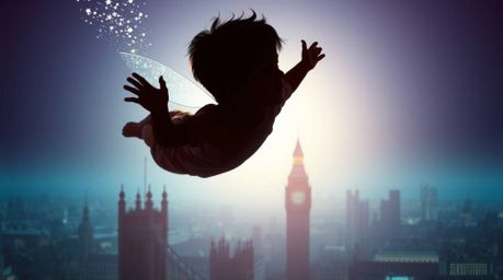 A captivating image of a young boy with dark skin silhouetted against the London skyline, magically flying with the help of p