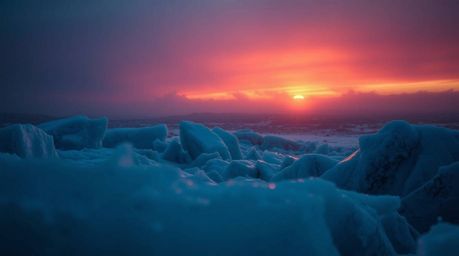 Experience the breathtaking beauty of a soft cinematic sunset casting vivid electric colors across icy polar glaciers. This s