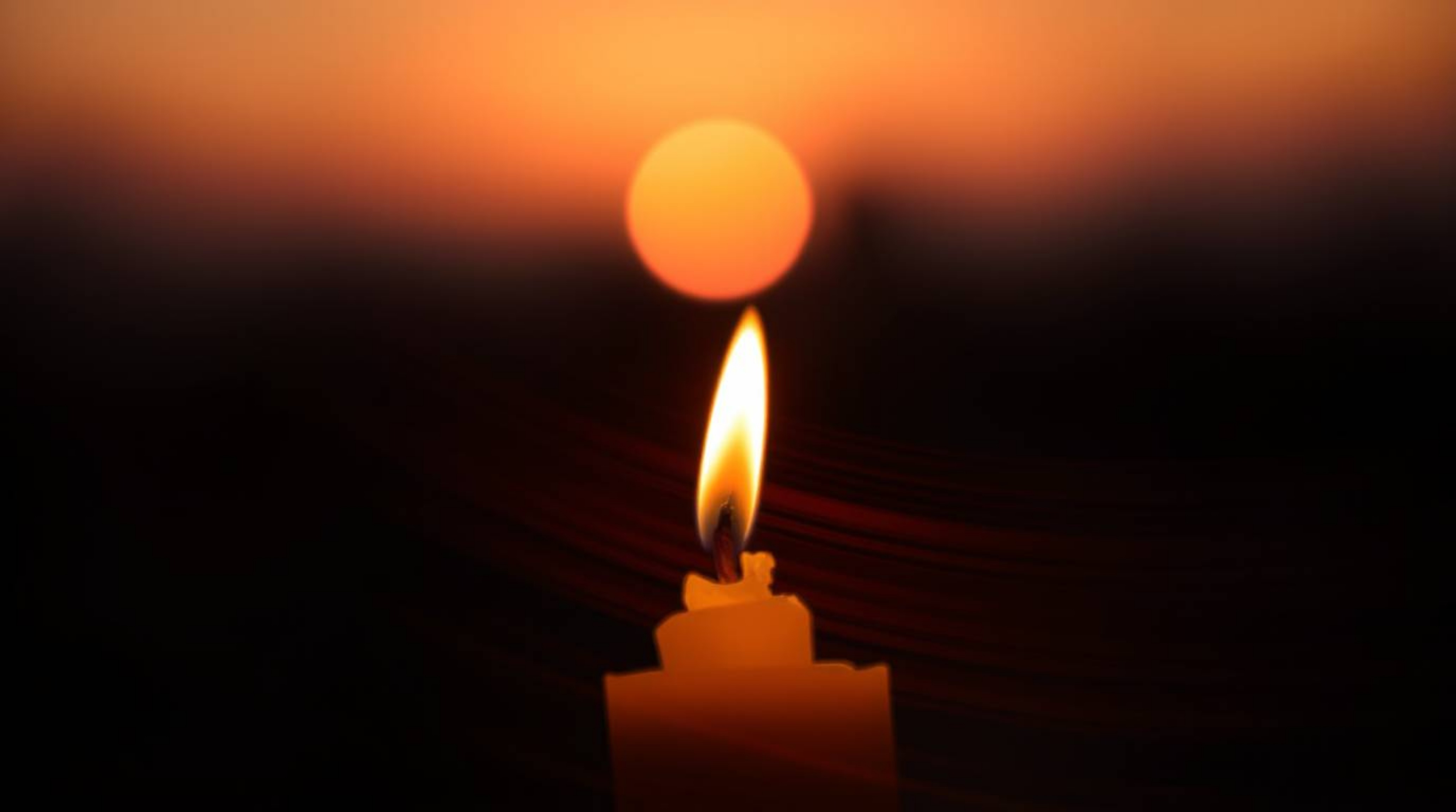 Explore the captivating fusion of dynamic candlelight motion and sunset gradient textures in these visually stunning images. 