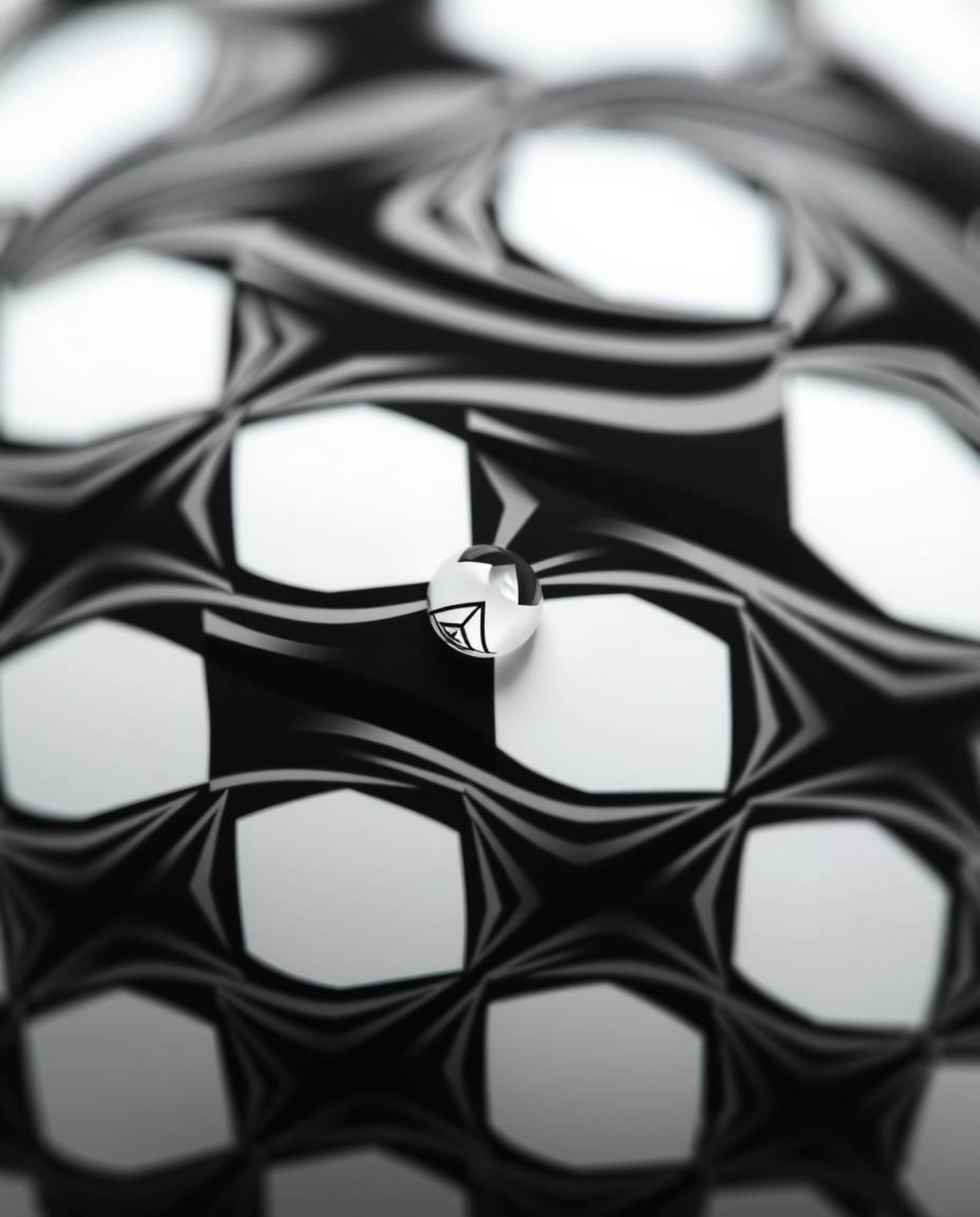 Explore the intricate details of a black and white geometric pattern with this extreme macro close-up. Inspired by optical il