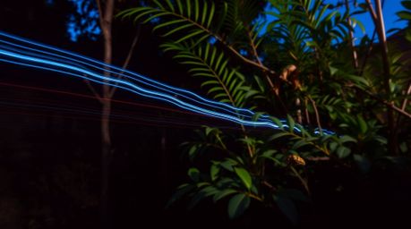 Explore the captivating world of long exposure photography with rich burgundy and deep blue hues, capturing mesmerizing motio