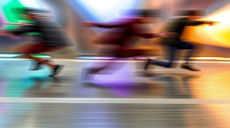 Experience dynamic motion captured through blurred lines and striking action poses.  The imagery showcases an iridescent grad