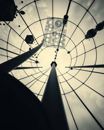 Experience a dreamlike, surreal low-angle perspective of a minimalist Bauhaus geometric pattern.  This artwork features circl