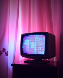 Experience a graceful and elegant retro-style TV screen exhibiting a captivating RGB separation glitch static, nestled within