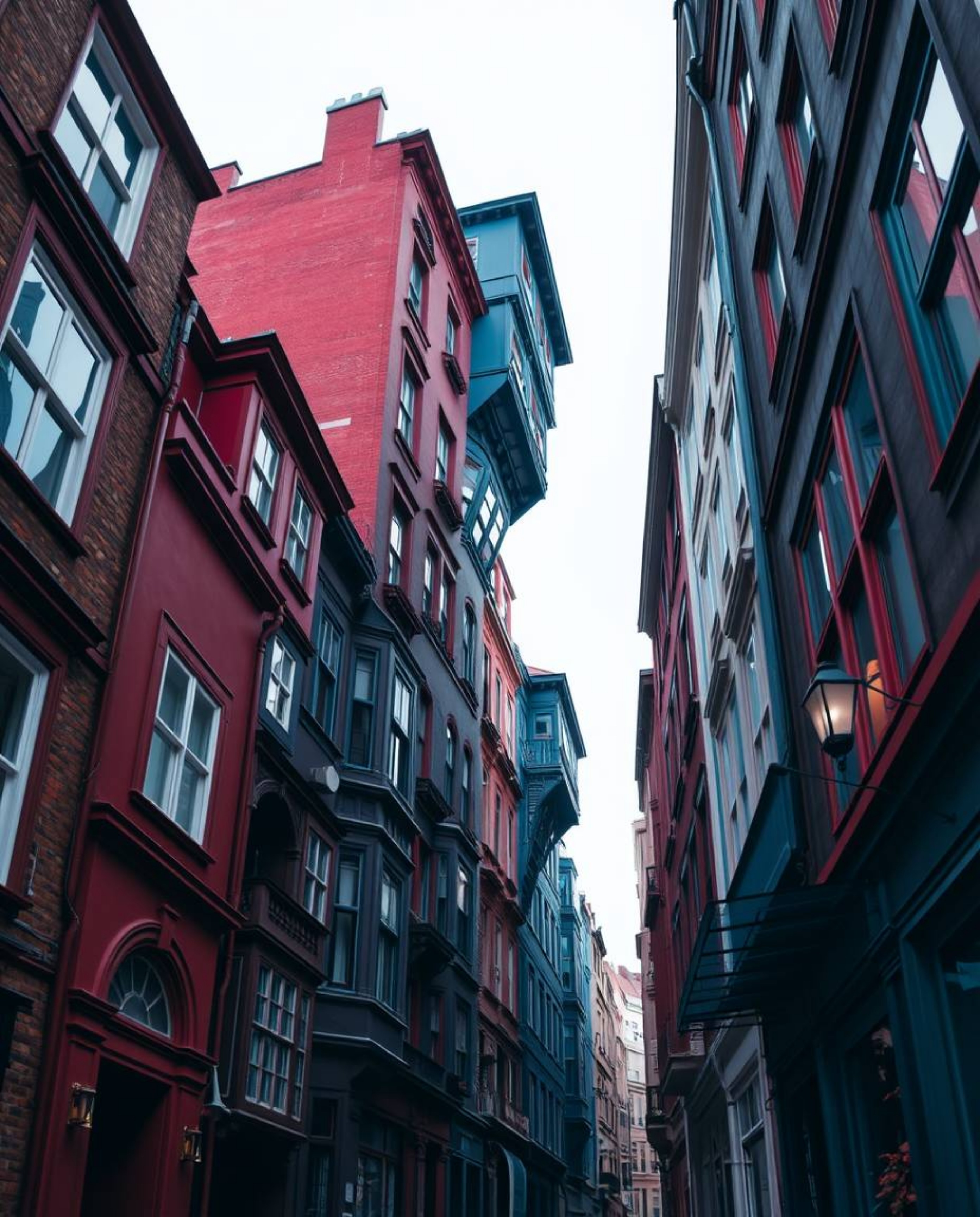 A captivating close-up reveals a surreal street scene where buildings defy gravity, folding and twisting into intricate, drea