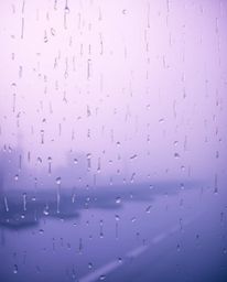 A dreamy rainy scene featuring a soft gradient texture blending pink, blue, and violet hues.  The minimal background showcase