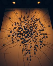 This professional fine art photograph presents an abstract city map ingeniously composed of geometric shapes, captured from a