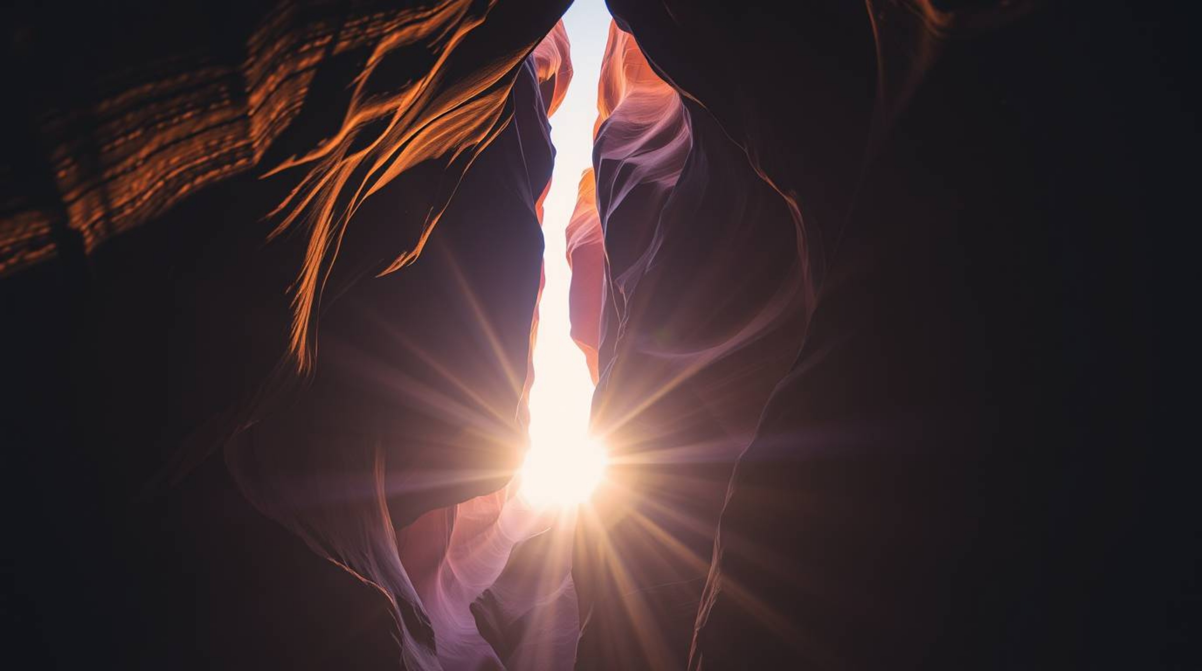 Experience the breathtaking beauty of creative light art illuminating a rocky canyon during a warm sunset. This captivating i