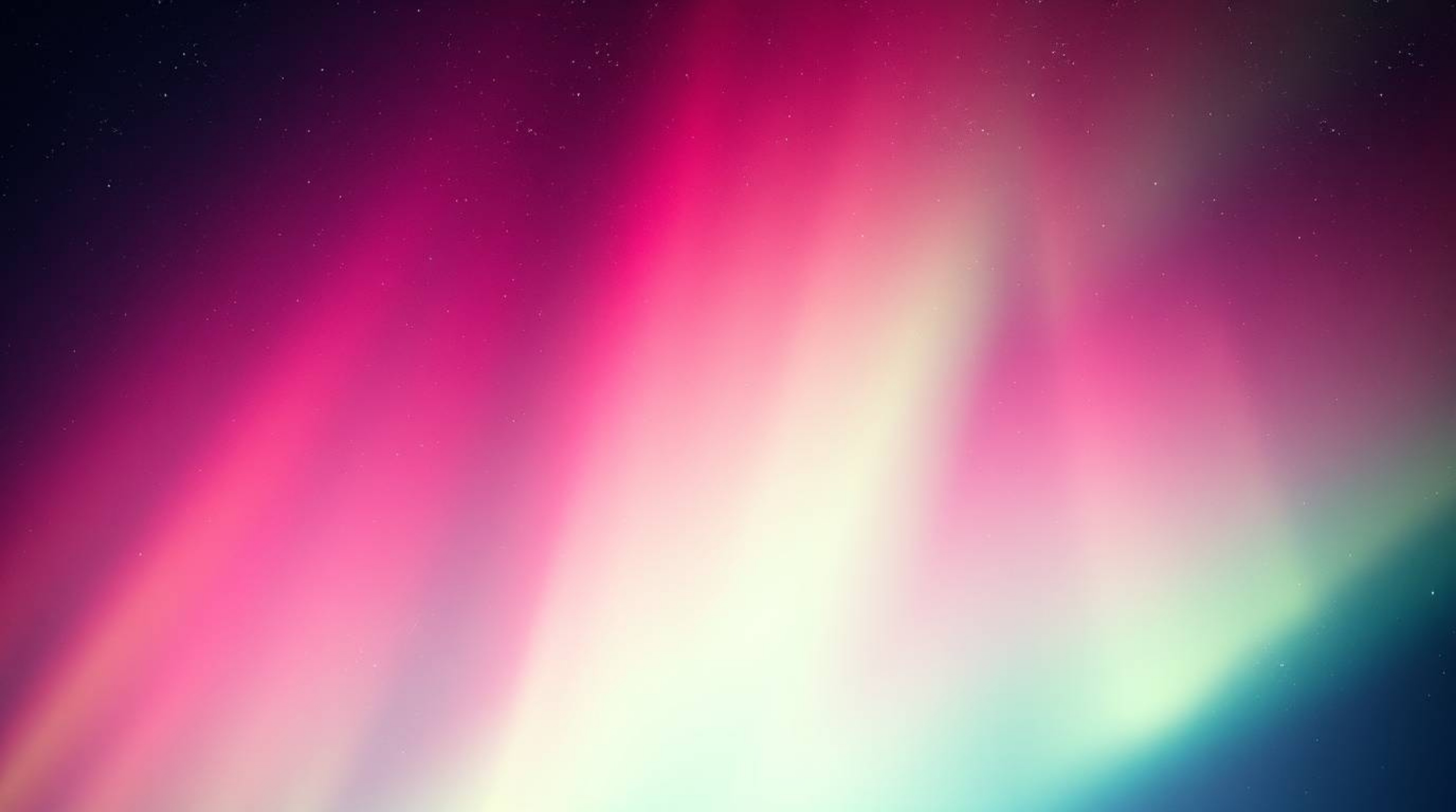 Experience the magic of the aurora borealis with this vibrant gradient texture inspired by deep sky colors. A high-angle pers