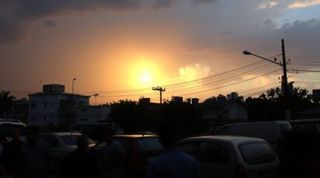 Experience the captivating beauty of candid street photography during a thunderstorm.  These images capture spontaneous momen