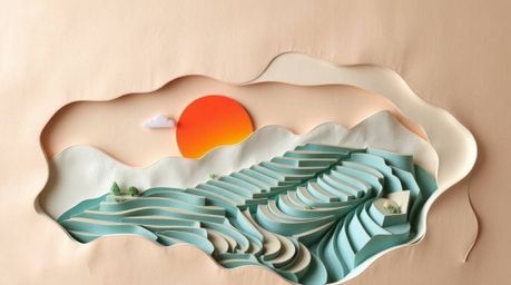 A graceful and elegant layered papier-mâché sculpture depicting a serene sunset over picturesque rice terraces.  The sculpted