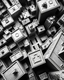 A stunning architectural photograph showcases a classic abstract city map composed of geometric shapes. Viewed from above, th