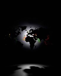 This striking image features a silhouetted world map beautifully formed from bright, colorful splashes, backlit by a strong l