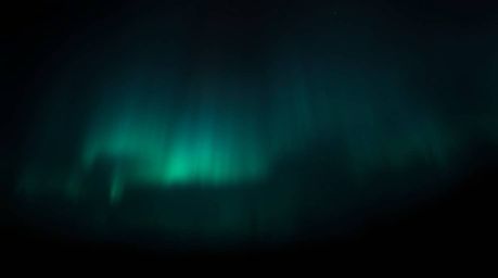 Explore the unsettling beauty of aurora borealis inspired gradient textures rendered in deep sky colors and dark tones, creat
