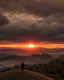 Natural earth tones depicting intense dramatic sunset over misty Tuscan hills, stormy skies, high tension, browns beiges mute